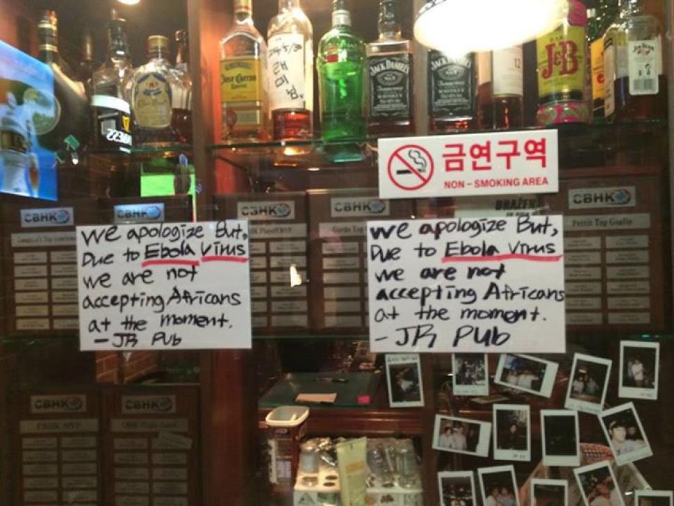 Outrage over signs barring Africans from  South Korean pub over Ebola fears