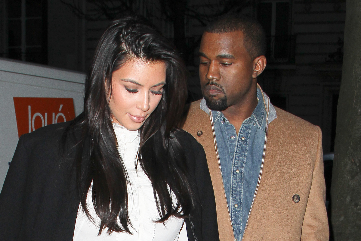 Kanye West shared a photo kissing Kim Kardashian after announcing he wants her back