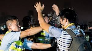 Hong Kong protests: Clashes as police clear road  