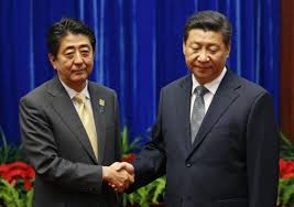 China's Xi, Japan's Abe hold landmark meeting