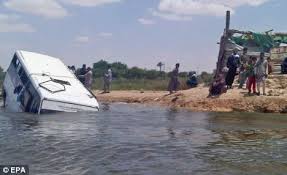 Eleven drown as bus plunges into river