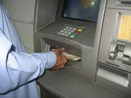 Receptionist accused of stealing with boss’ ATM card