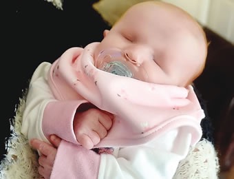 Baby girl born without eyes, will never see