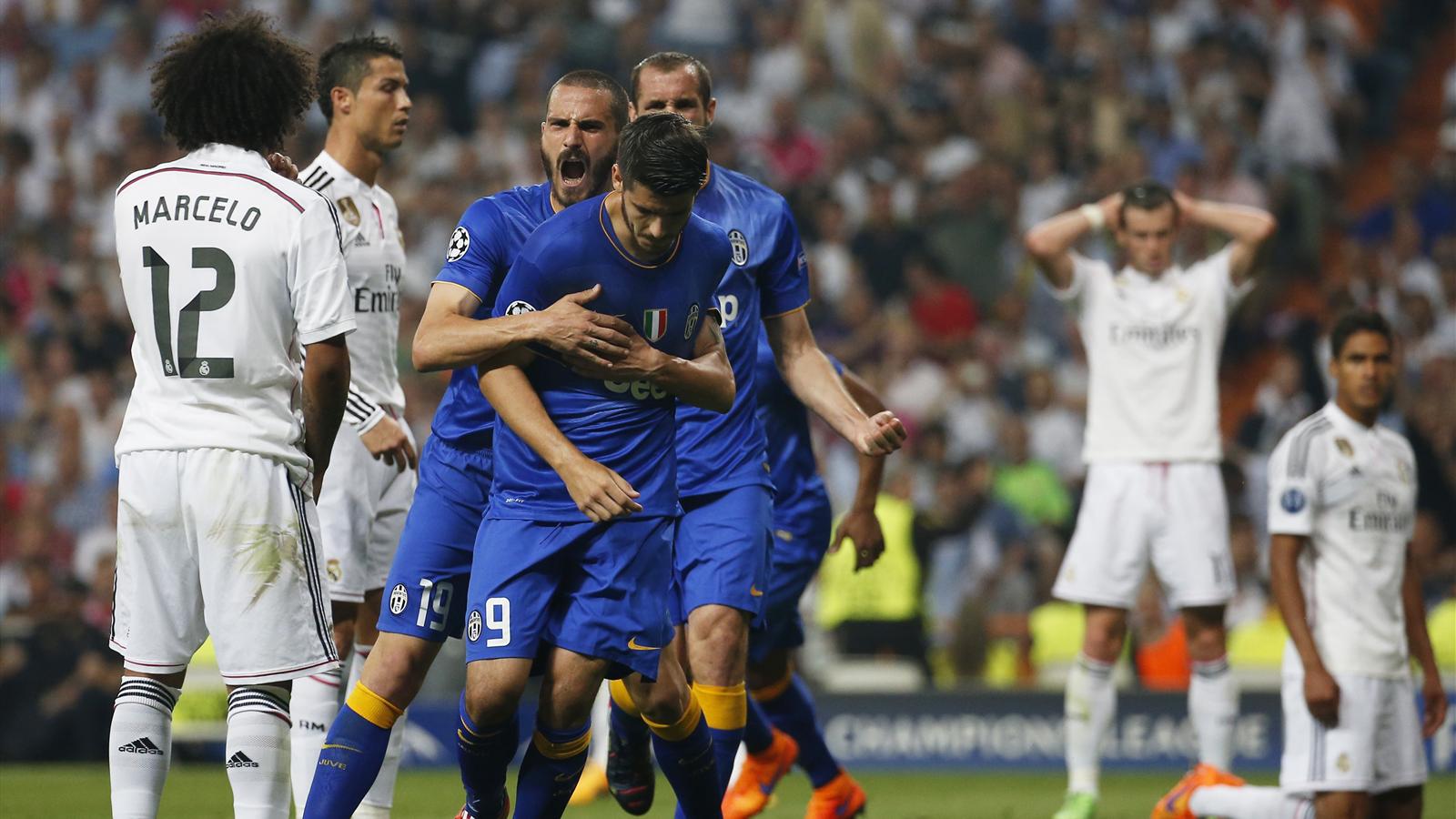 Juventus edge out Real Madrid to set up final with Barca