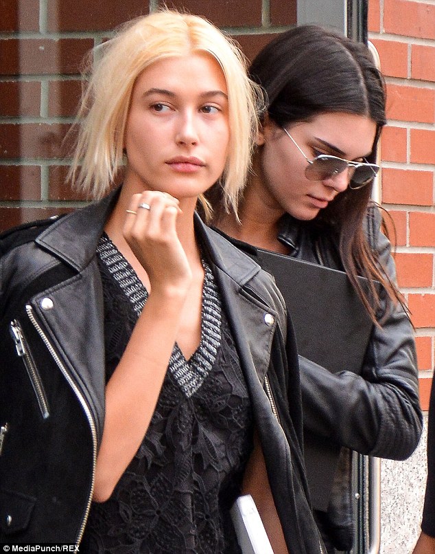 Kendall Jenner lounging in the pool with pal   Hailey Baldwin
