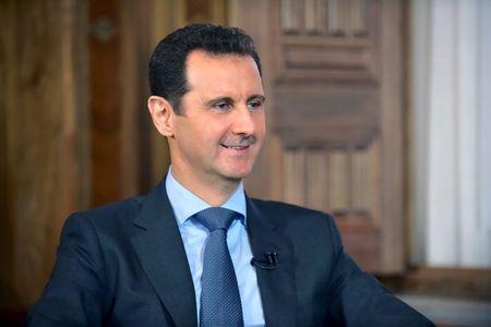 U.S. says Assad must go, timing down to negotiation