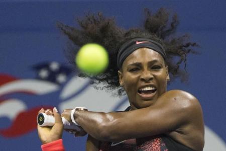 Serena roars back to keep Grand Slam bid alive
