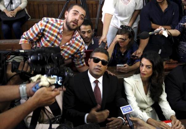 Egypt's Sisi pardons 100 prisoners, including Al Jazeera journalists