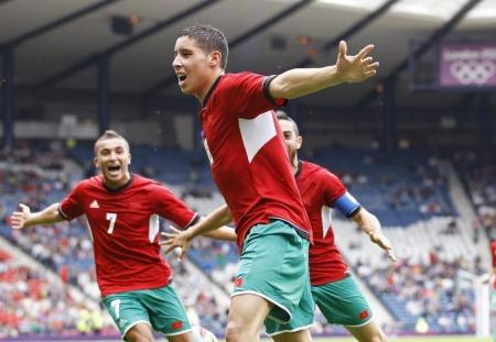 10-man Morocco begin World Cup bid with home victory