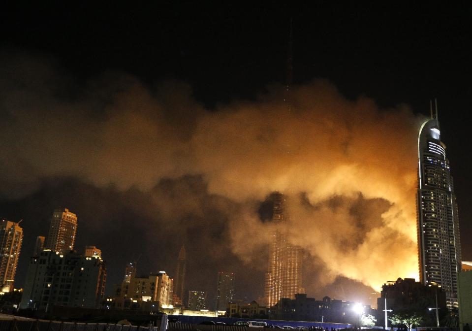 Man hangs on balcony of multi-storey Dubai luxury hotel  to survive New Year fire