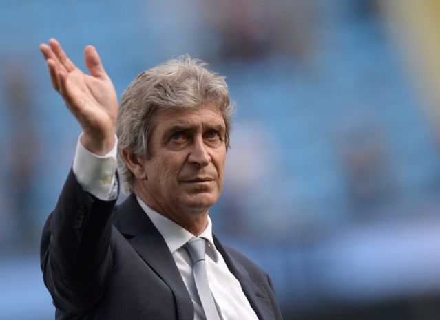 Parting gift: Man City owner Sheikh Mansour gives Pellegrini Lowry painting