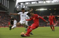 Swansea stuns Liverpool 3-2 at Anfield to climb off bottom of league