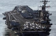 China, Russia send ships to chase U.S. aircraft carrier