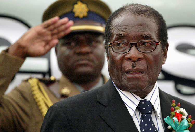 Mugabe's face  'glowed' with relief when he agreed to step down: priest
