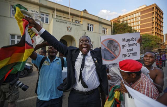 Jubliations in the Streets of  Zimbabwe as Robert Mugabe resigns as President After 37 Years