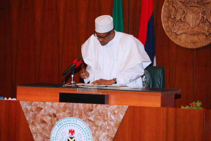 Prsident Buhari Buhari signs  Federal Competition and Consumer Protection Act