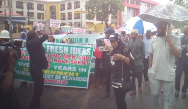 Massive protests in Abuja Nigerians over alleged hijacking of presidency by cabal