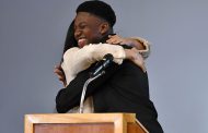 British schoolboy Aker Okoye  hugs Duchess of Sussex Meghan, says ‘sorry Harry’