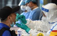 China shuts schools and cancels flights as Beijing reports an 'extremely grave' surge in new coronavirus cases