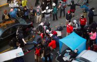 Man drives into Seattle protest, shoots protester