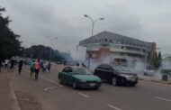 Police fire teargas at people protesting against alleged SARS brutality