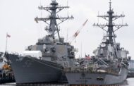 Russia chases off U.S. warship in spat over territorial waters