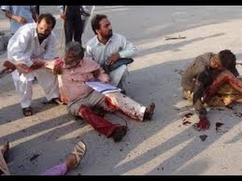 Police: Bombs kill dozens at Pakistan parade
