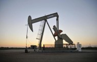 Oil prices drop on China data, firmer dollar
