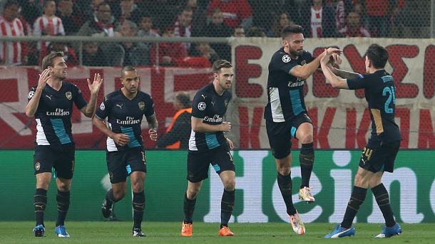 Arsenal pulls off 'mission impossible' as Giroud's hat trick see them through to knock out stage