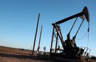 Oil futures ends above $51 first time since July