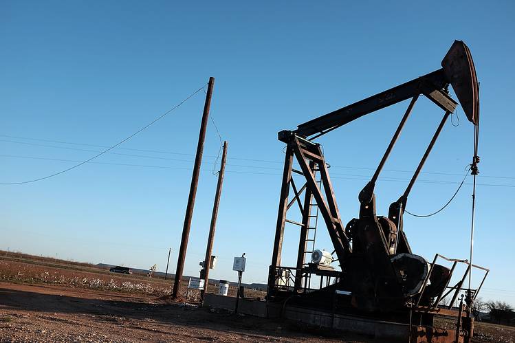 Oil futures ends above $51 first time since July