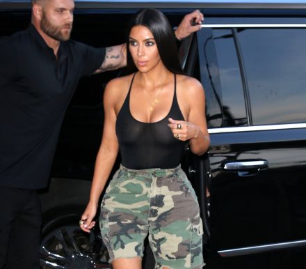 Kim Kardashian continues to push boundaries, wears sheer top and camo shorts