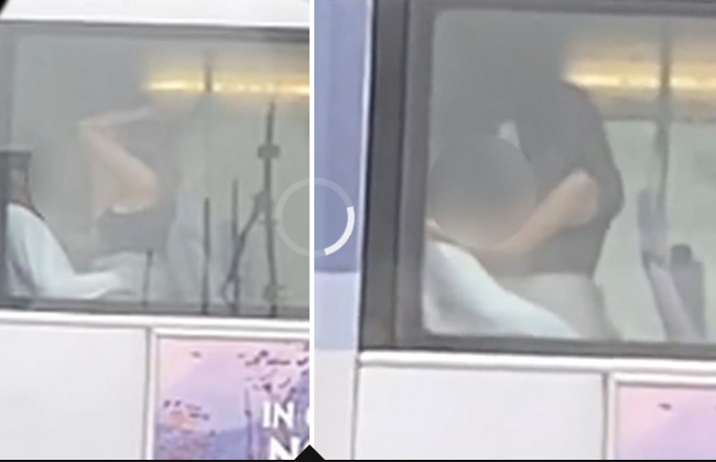 Randy couple caught 'having sex' on top deck of bus during road