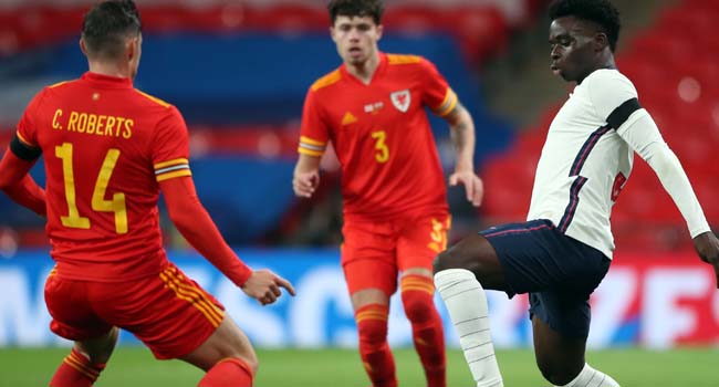 Arsenal’s Bukayo Saka makes England debut as Three Lions wallop Wales