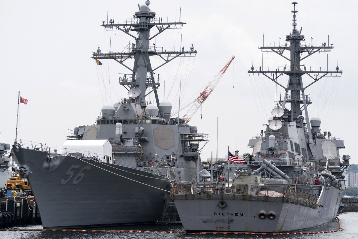 Russia chases off U.S. warship in spat over territorial waters