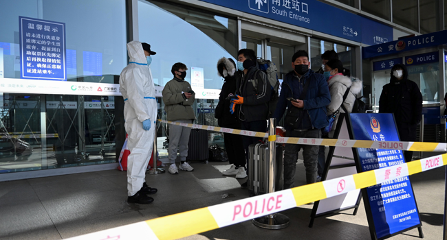 China seals off two cities to control COVID-19 outbreak