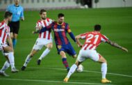 Messi shows his worth but Suarez double extend Atletico lead